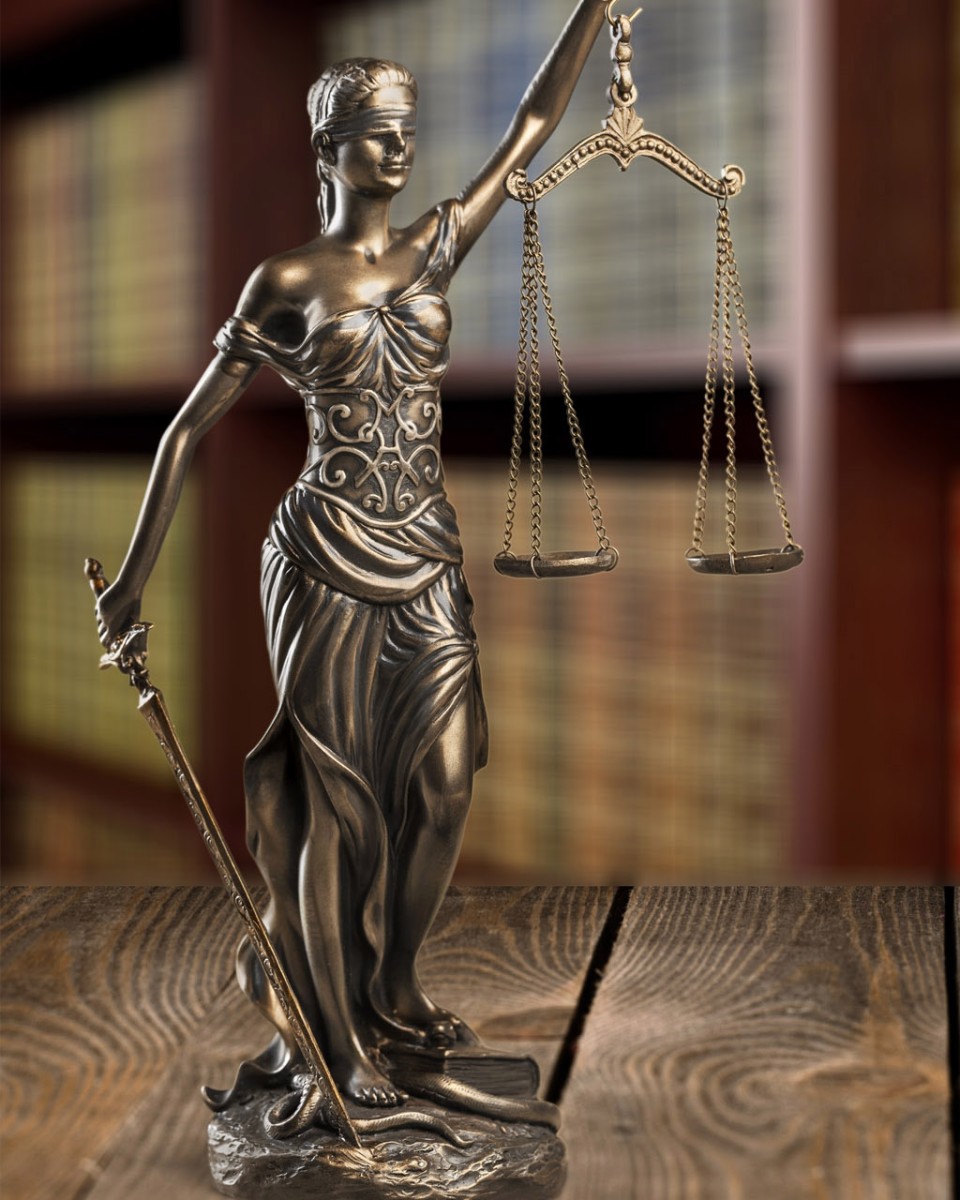 Statue of Justice in a law library<br>